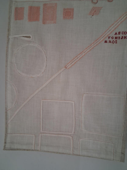 Travaux d'exercices de couture et de broderies écolière